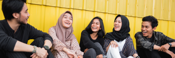  Happy young migrants in a group